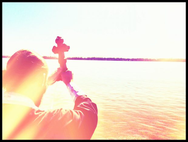 Father Matthew, blessing the Mississippi River on Theophany (Photo by Rod Dreher)